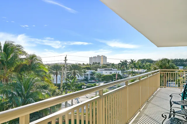 a view of a balcony with city view