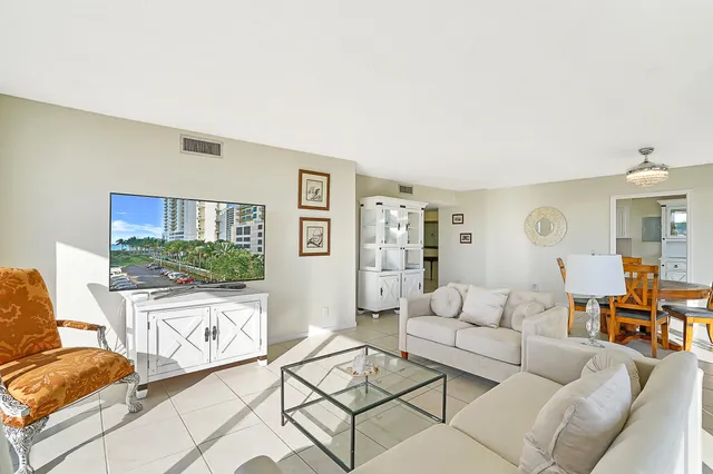 a living room with furniture and a couch