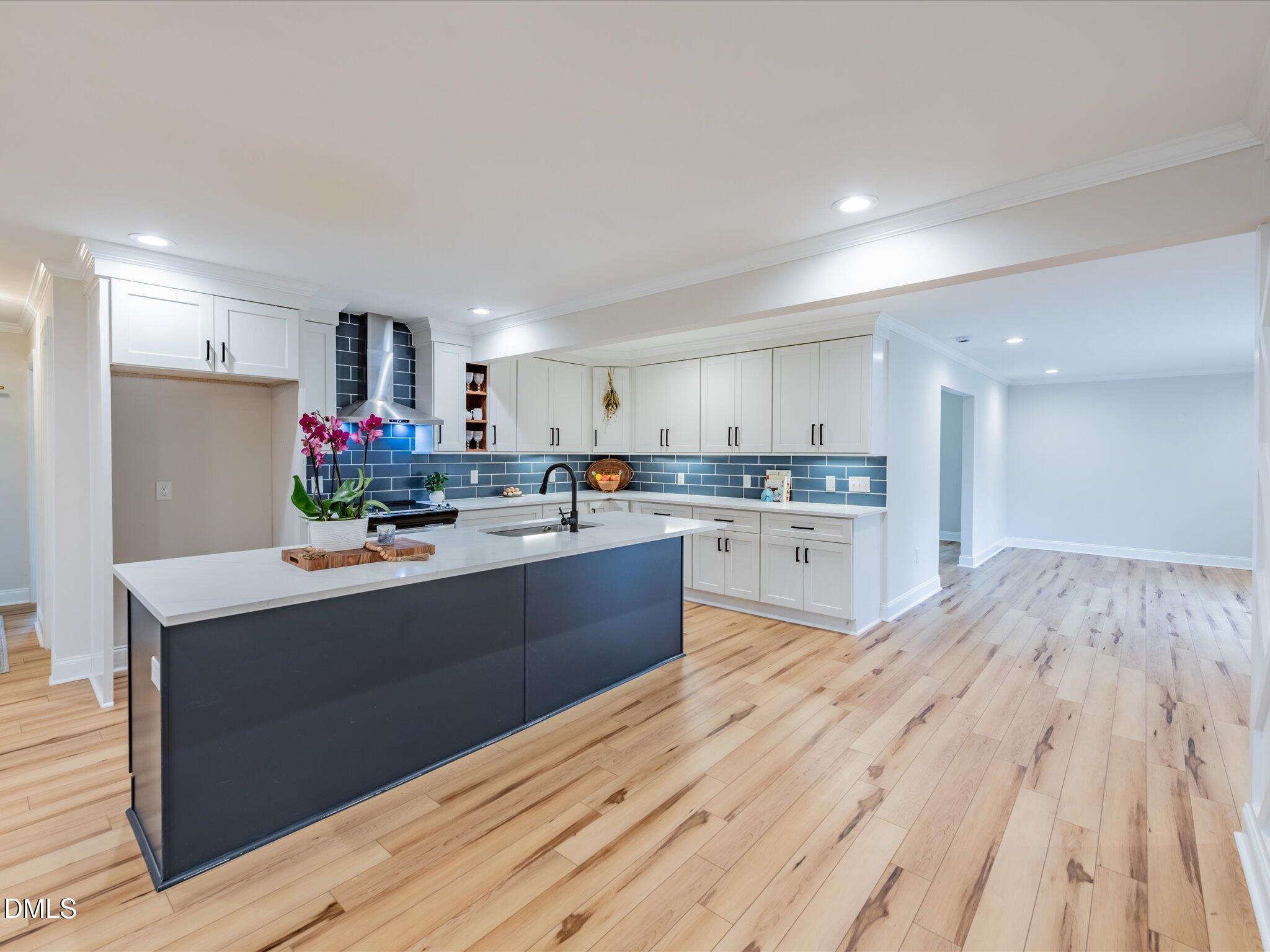 3320 High Gate Road Raleigh, NC 27603 - Photo 9 of 38 Featuring kitchen Island and Cabinets