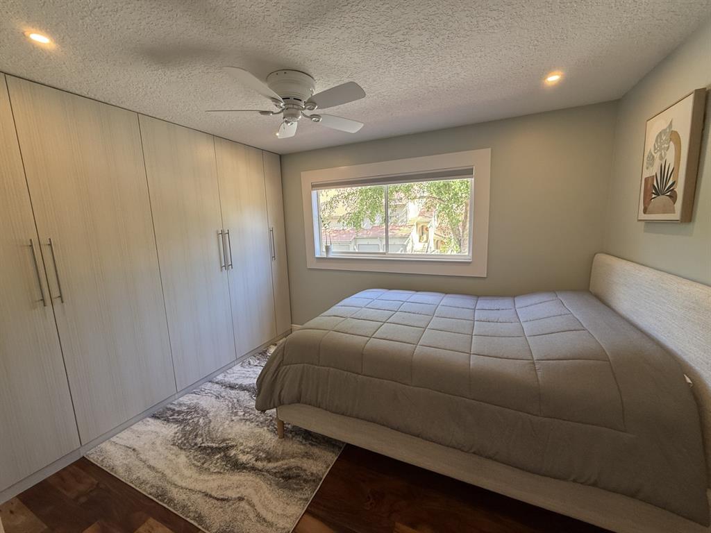 5560 Coach House Circle, Unit C Boca Raton, FL 33486 - Photo 25 of 31 a bedroom with a bed and a window