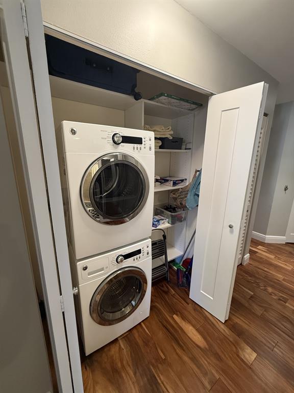 5560 Coach House Circle, Unit C Boca Raton, FL 33486 - Photo 28 of 31 a view of a storage and utility room with washer and dryer