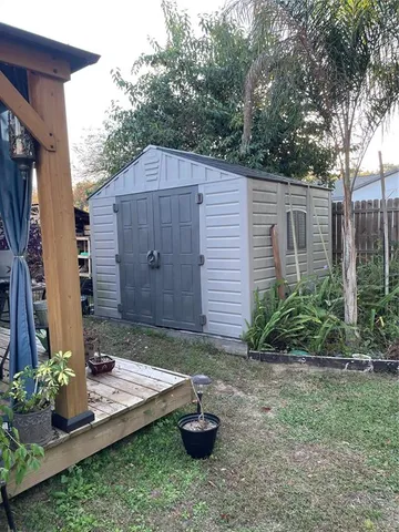 a backyard of a house with lots of green space
