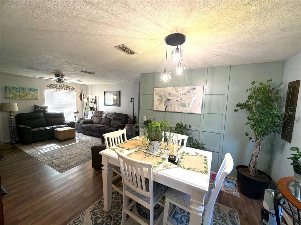 285 Northwest 65th Street Ocala, FL 34475 - Photo 4 of 18 a view of a dining room with furniture