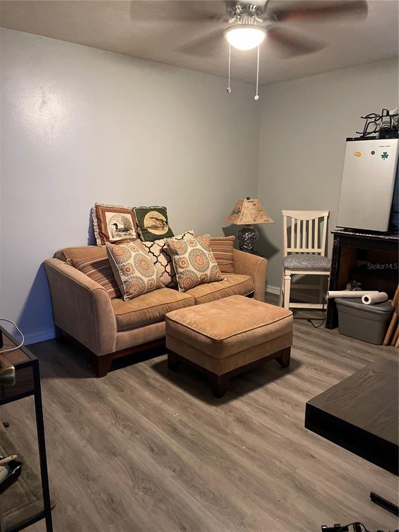 285 Northwest 65th Street Ocala, FL 34475 - Photo 6 of 18 a spacious bedroom with a bed and wooden floor