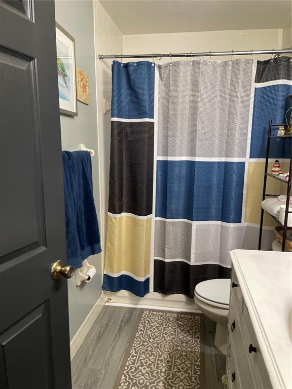 285 Northwest 65th Street Ocala, FL 34475 - Photo 7 of 18 a bathroom with a sink toilet and shower