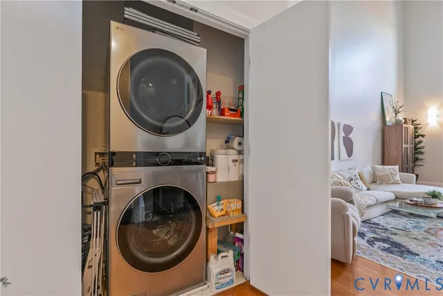 wooden floor with couches and a living room with furniture
