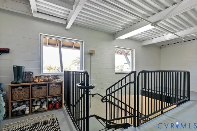 a front view of house with a garden