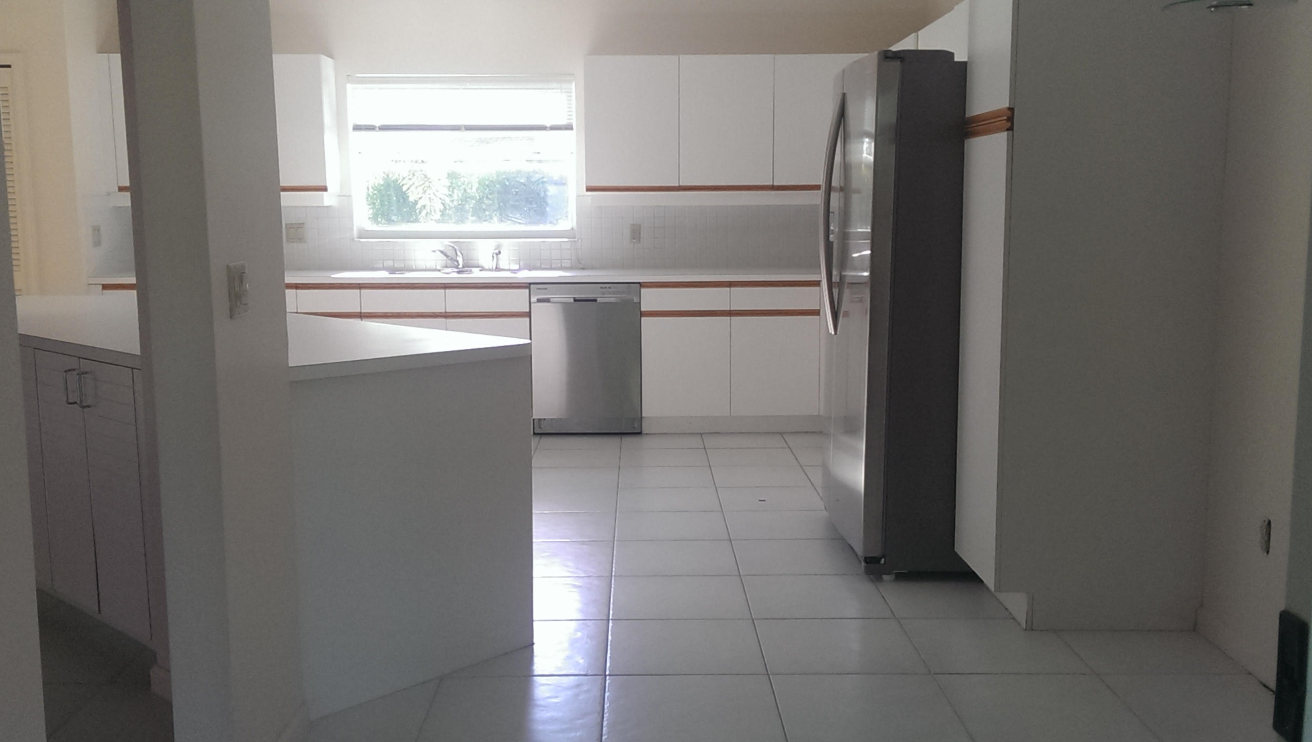 6945 Northwest 3rd Avenue Boca Raton, FL 33487 - Photo 5 of 12 lot of light in kitchen