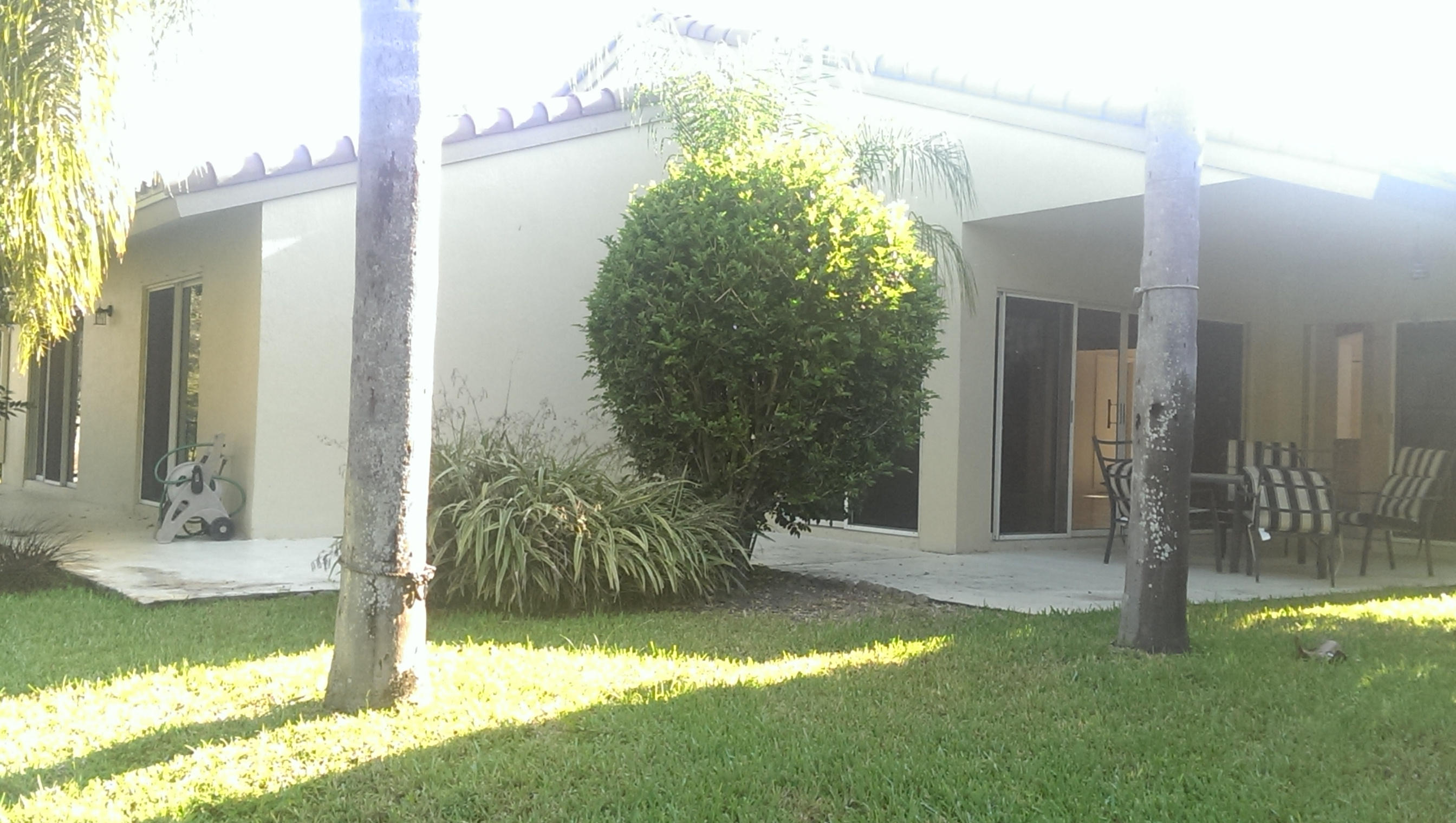 6945 Northwest 3rd Avenue Boca Raton, FL 33487 - Photo 7 of 12 covered patio