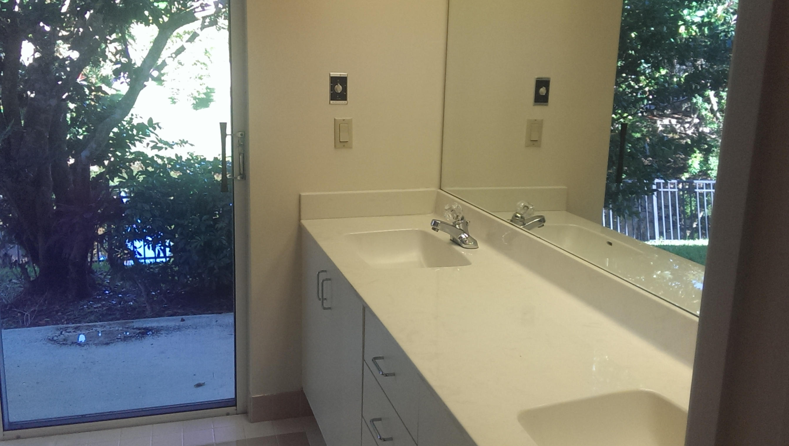 6945 Northwest 3rd Avenue Boca Raton, FL 33487 - Photo 10 of 12 bathroom with backyard view
