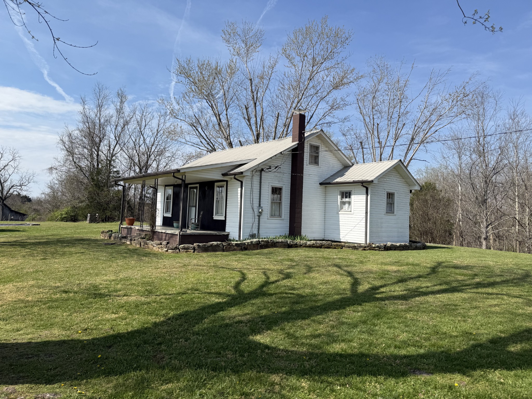 335 Nelson Cemetery Road Monroe, TN 38573 - Photo 73 of 81 a front view of a house with swimming pool having outdoor seating