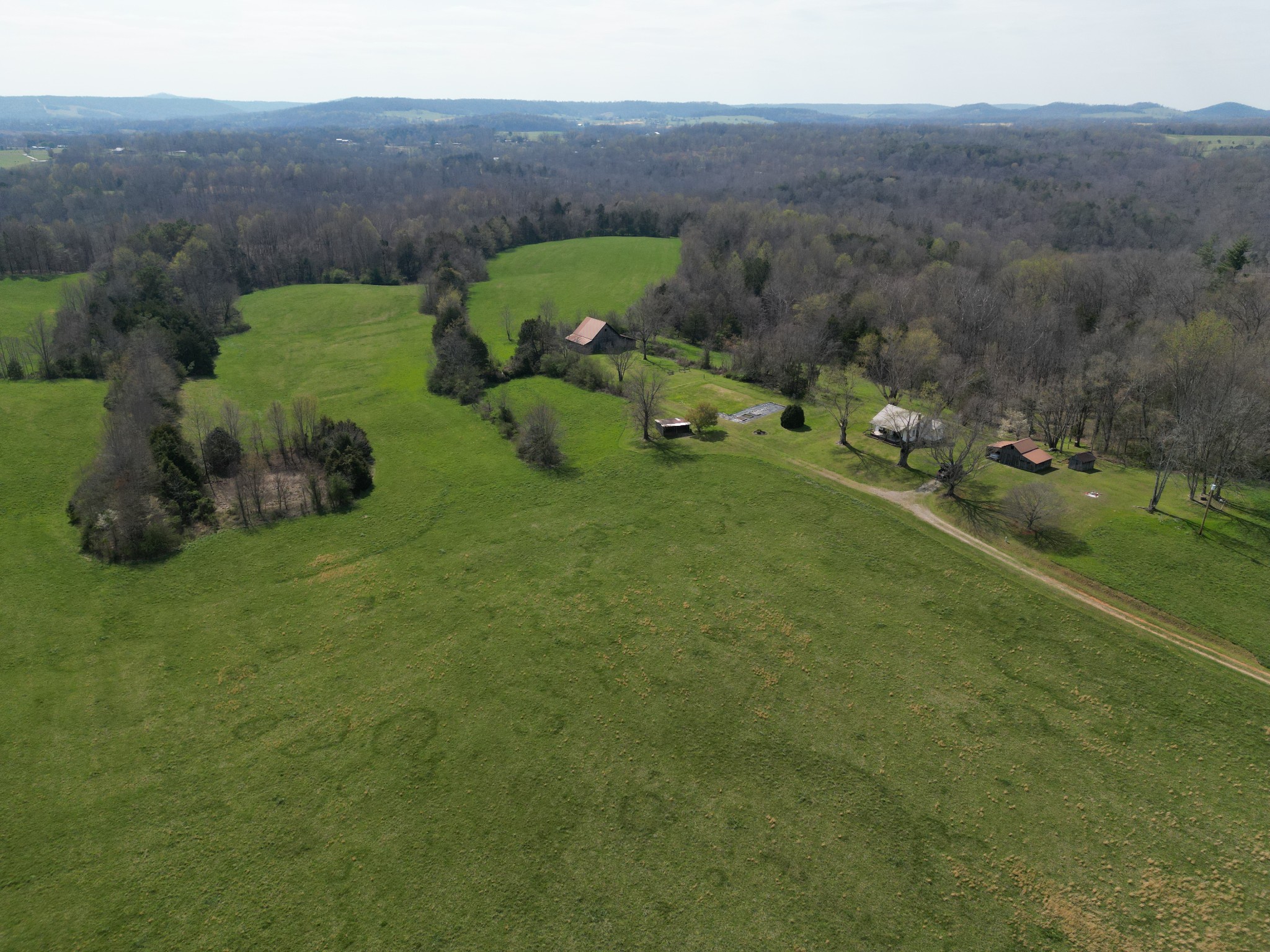 335 Nelson Cemetery Road Monroe, TN 38573 - Photo 10 of 81 an aerial view of a house with yard