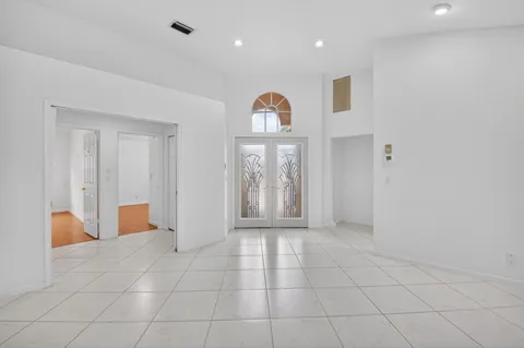 a view of an empty room and window