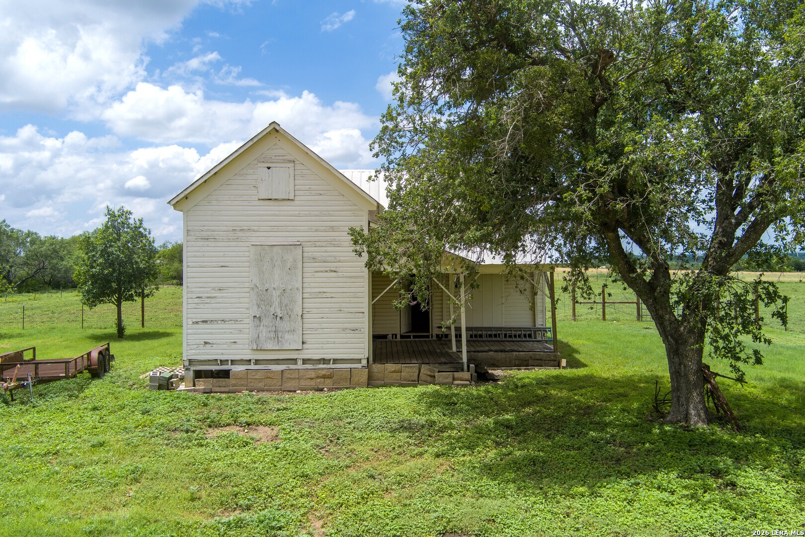 4515 Stapper Road St. Hedwig, TX 78152 - Photo 40 of 64 a front view of a house with a garden