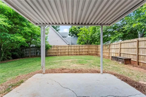 a view of a backyard with a garden