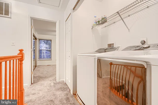 a view of a bedroom from a hallway