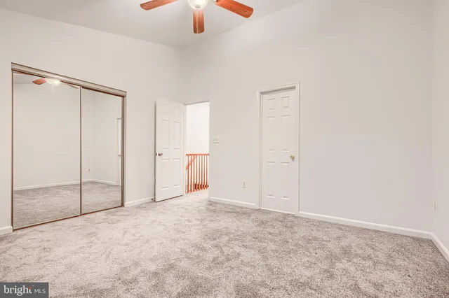 an empty room with fan
