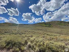 800 Homestead Road Road Cokeville, WY 83114 - Photo 5 of 49 Expansive open terrain with natural ground cover and distant tree lines