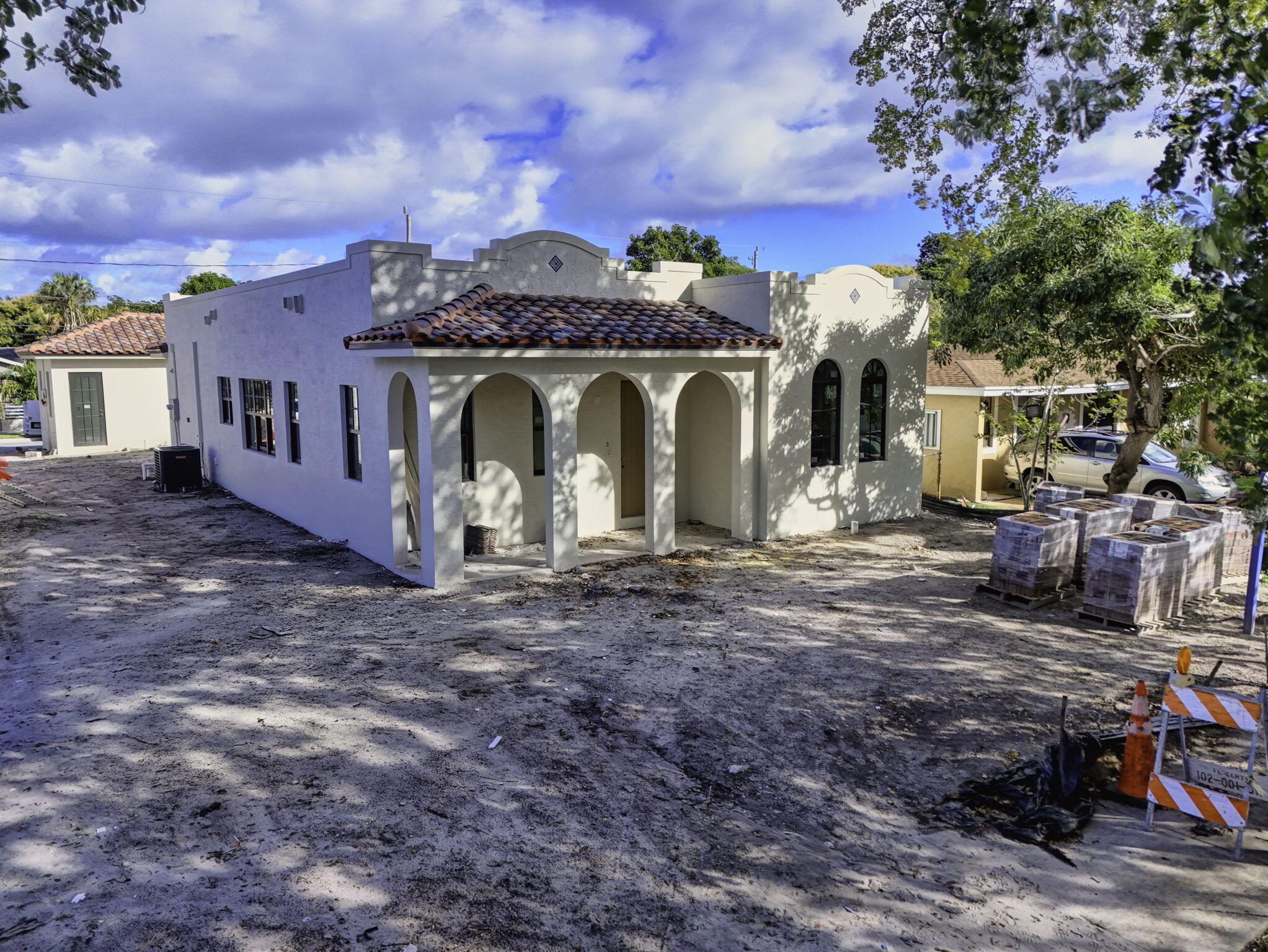 1013 Ardmore Road West Palm Beach, FL 33401 - Photo 13 of 35 a front view of a house with a yard