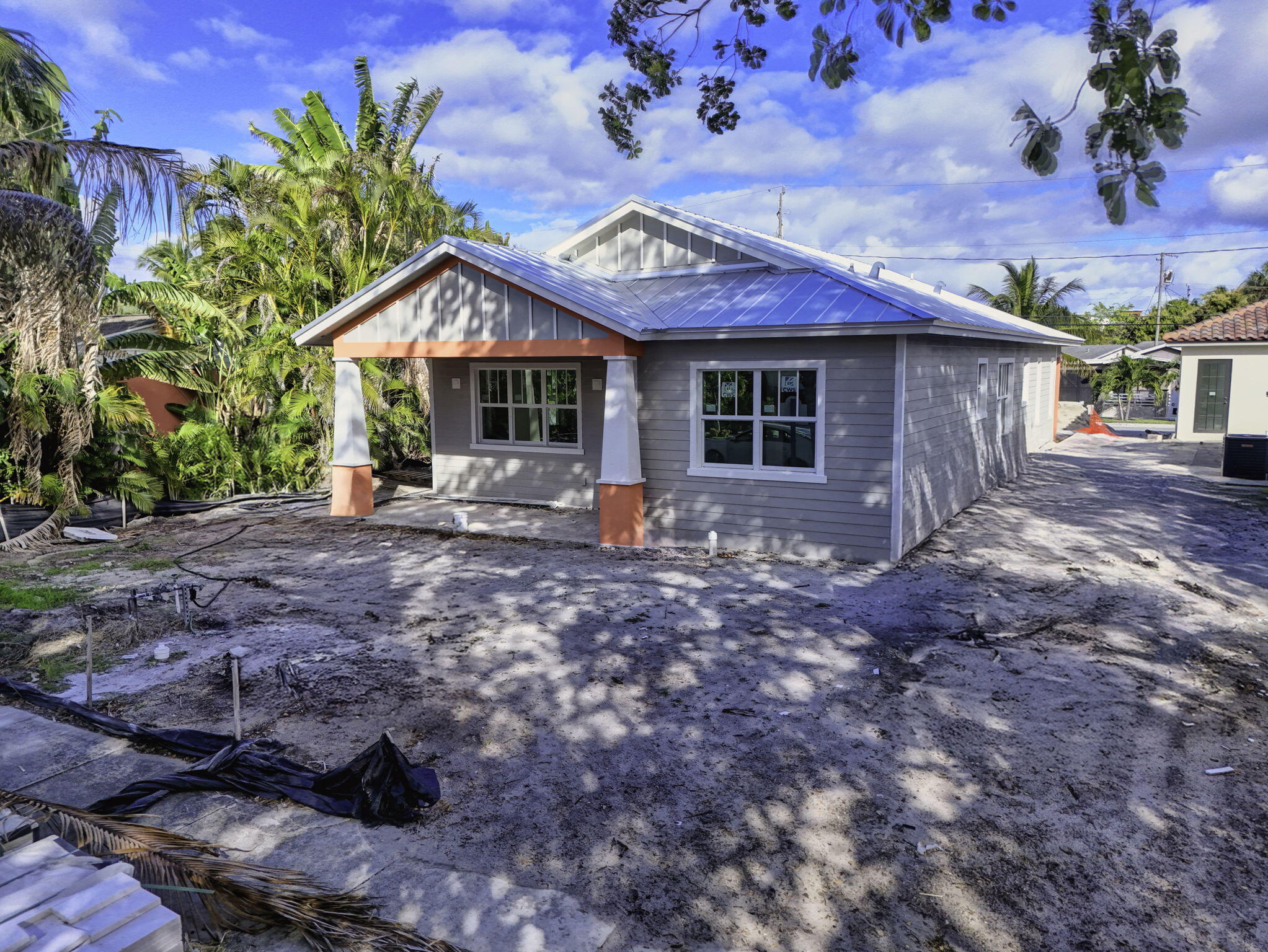 1013 Ardmore Road West Palm Beach, FL 33401 - Photo 14 of 35 a front view of a house with garden