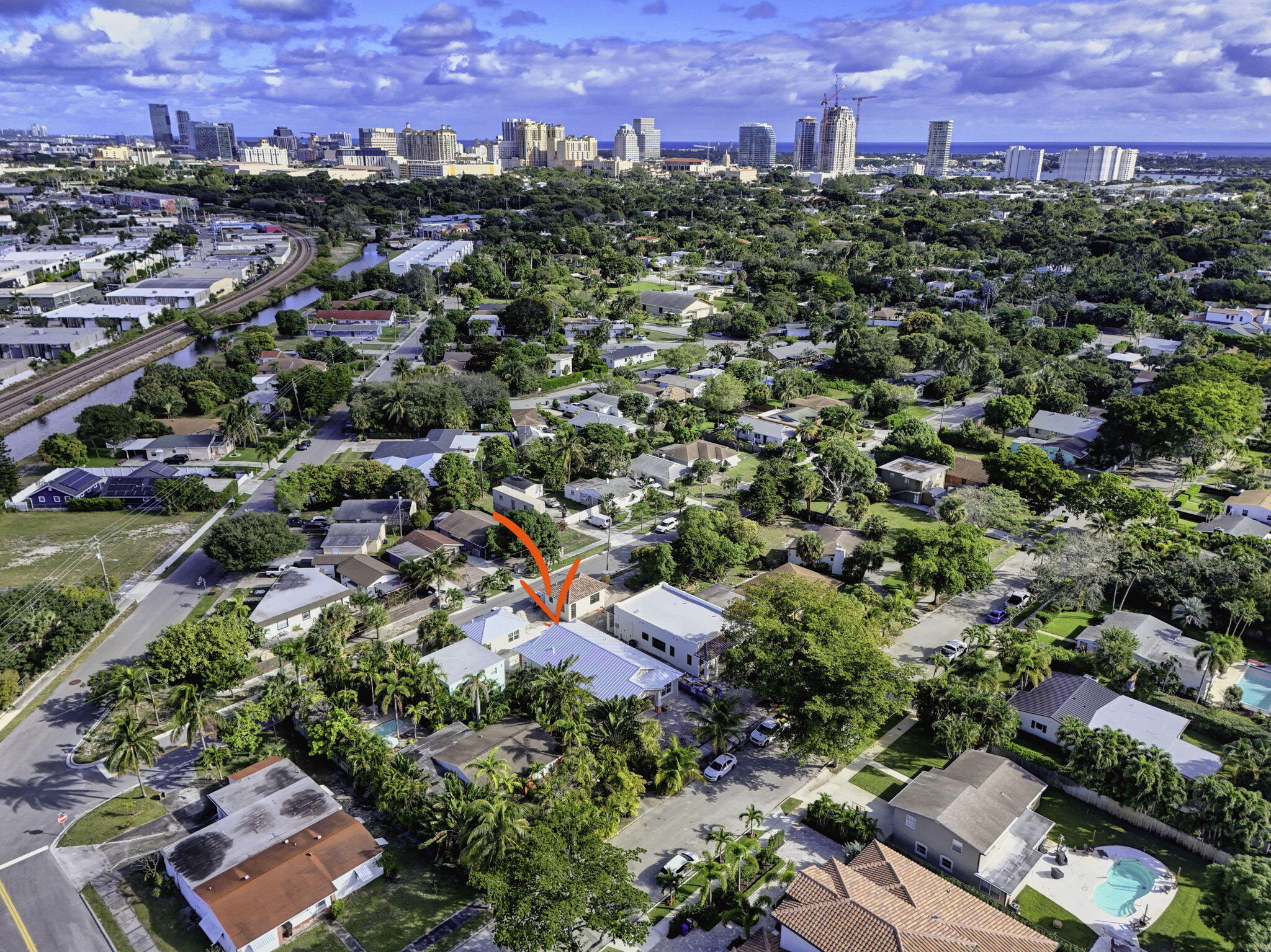 1013 Ardmore Road West Palm Beach, FL 33401 - Photo 33 of 35 an aerial view of a city with lots of residential buildings