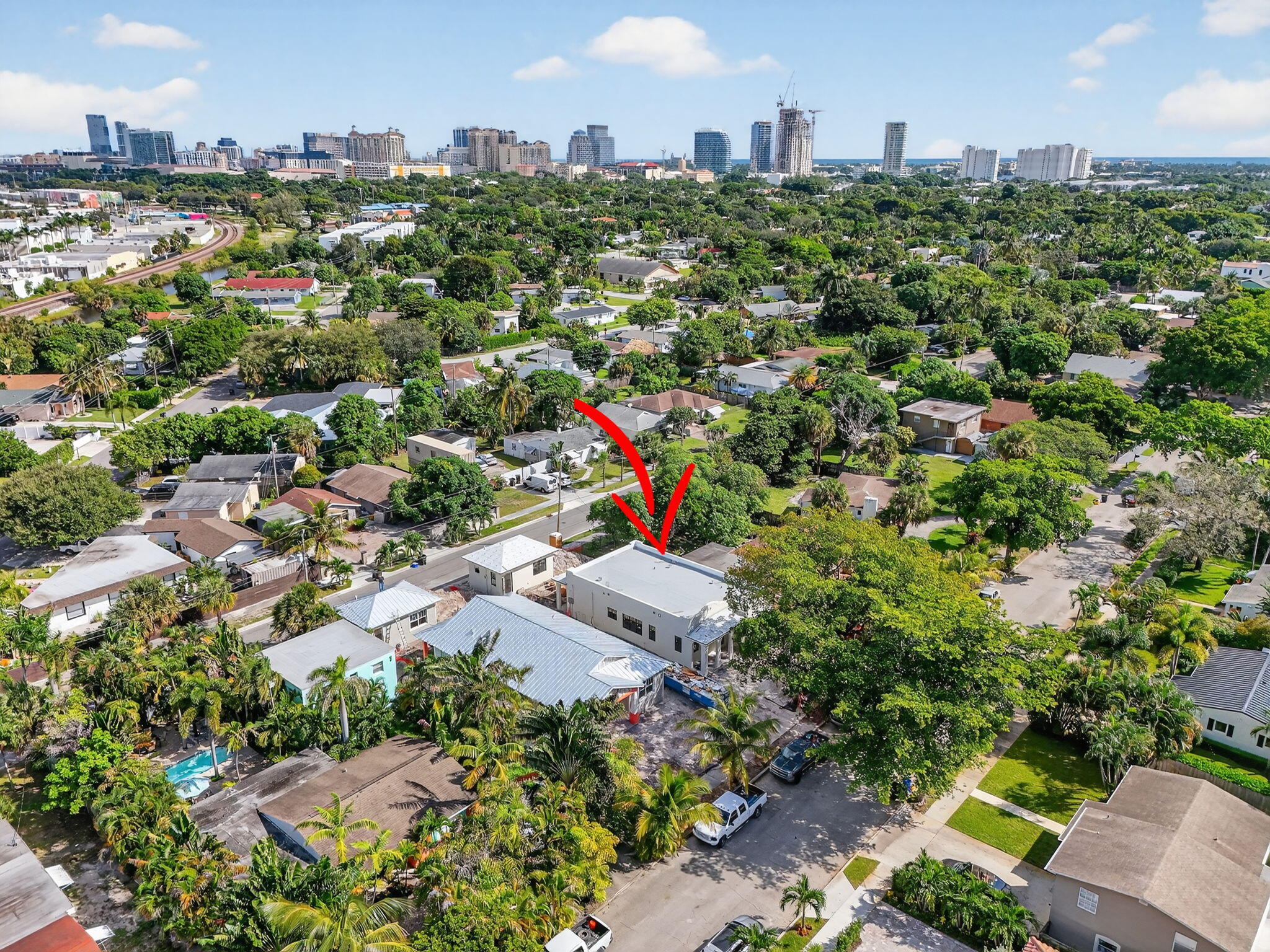 1013 Ardmore Road West Palm Beach, FL 33401 - Photo 4 of 35 an aerial view of a city with lots of residential buildings