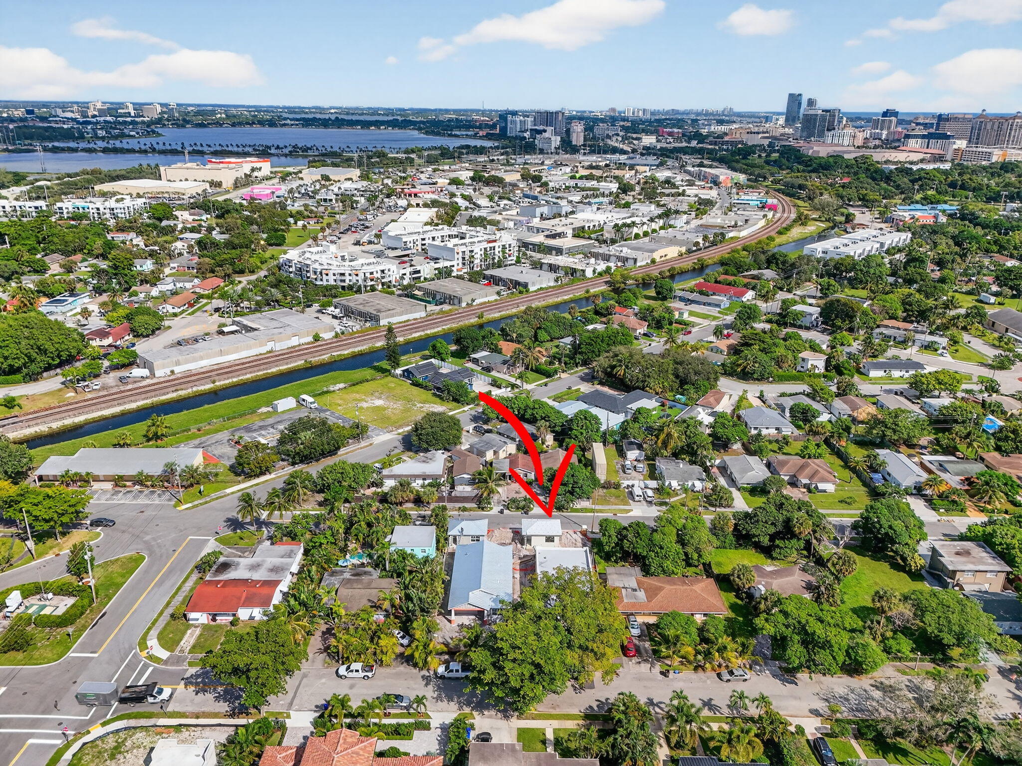 1013 Ardmore Road West Palm Beach, FL 33401 - Photo 6 of 35 an aerial view of residential building and lake