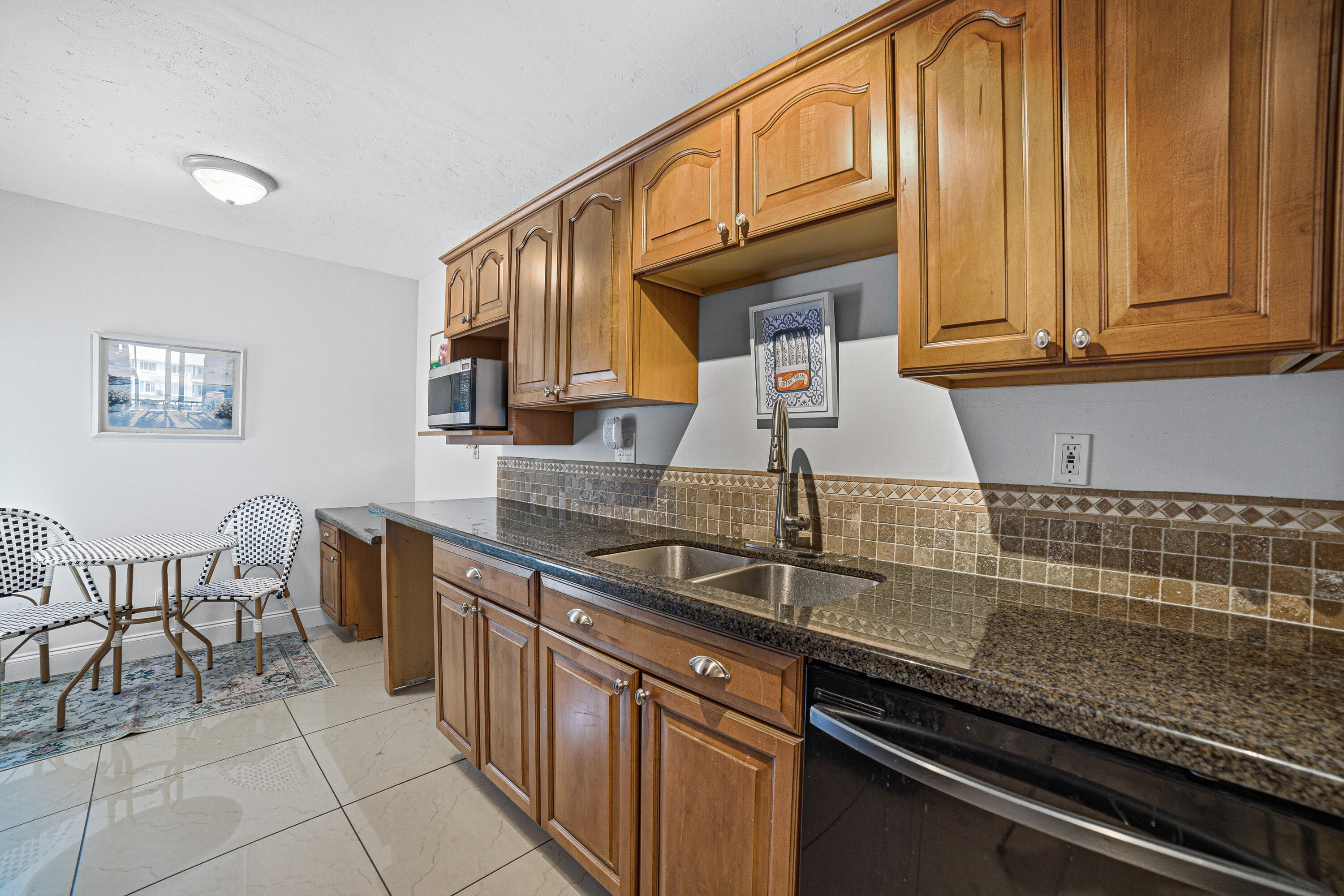 6 Royal Palm Way, Unit 211 Boca Raton, FL 33432 - Photo 10 of 32 Kitchen - Generous cabinet storage in wa