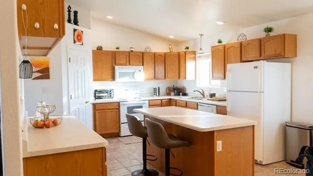 a living room with furniture fireplace and flat screen tv
