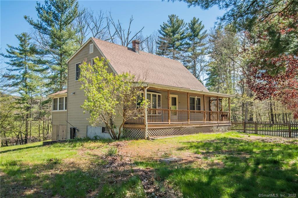 319 River Road Killingly, CT 06241 - Photo 1 of 1 a front view of a house with a yard