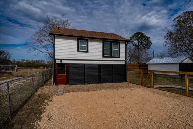 a view of a house with a garage