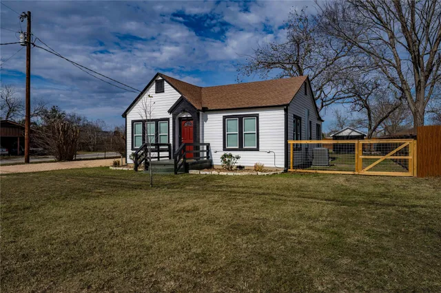 a house view with a garden space
