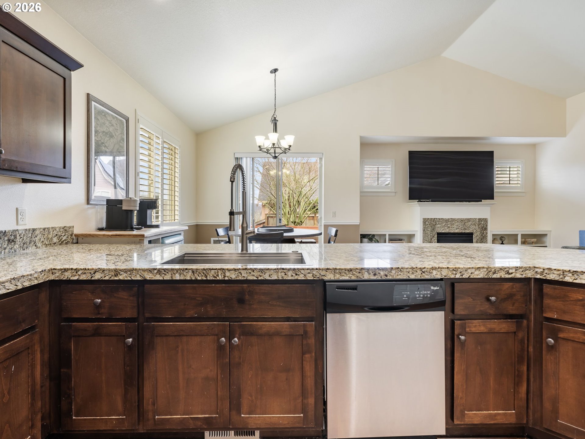 4081 Southwest Binford Avenue Gresham, OR 97080 - Photo 17 of 43 a kitchen with granite countertop a sink and a stove