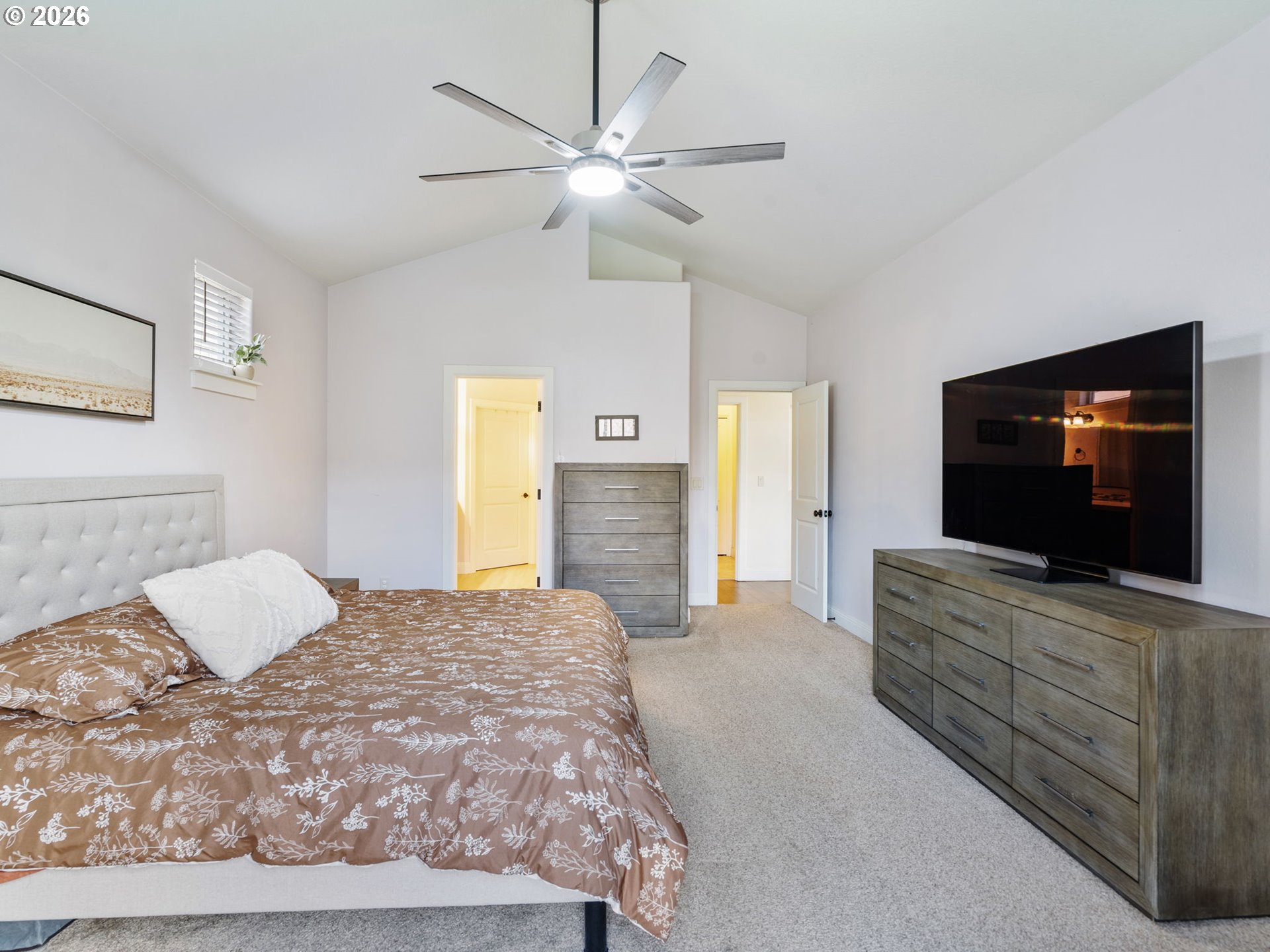 4081 Southwest Binford Avenue Gresham, OR 97080 - Photo 25 of 43 a bedroom with a bed and a flat screen tv