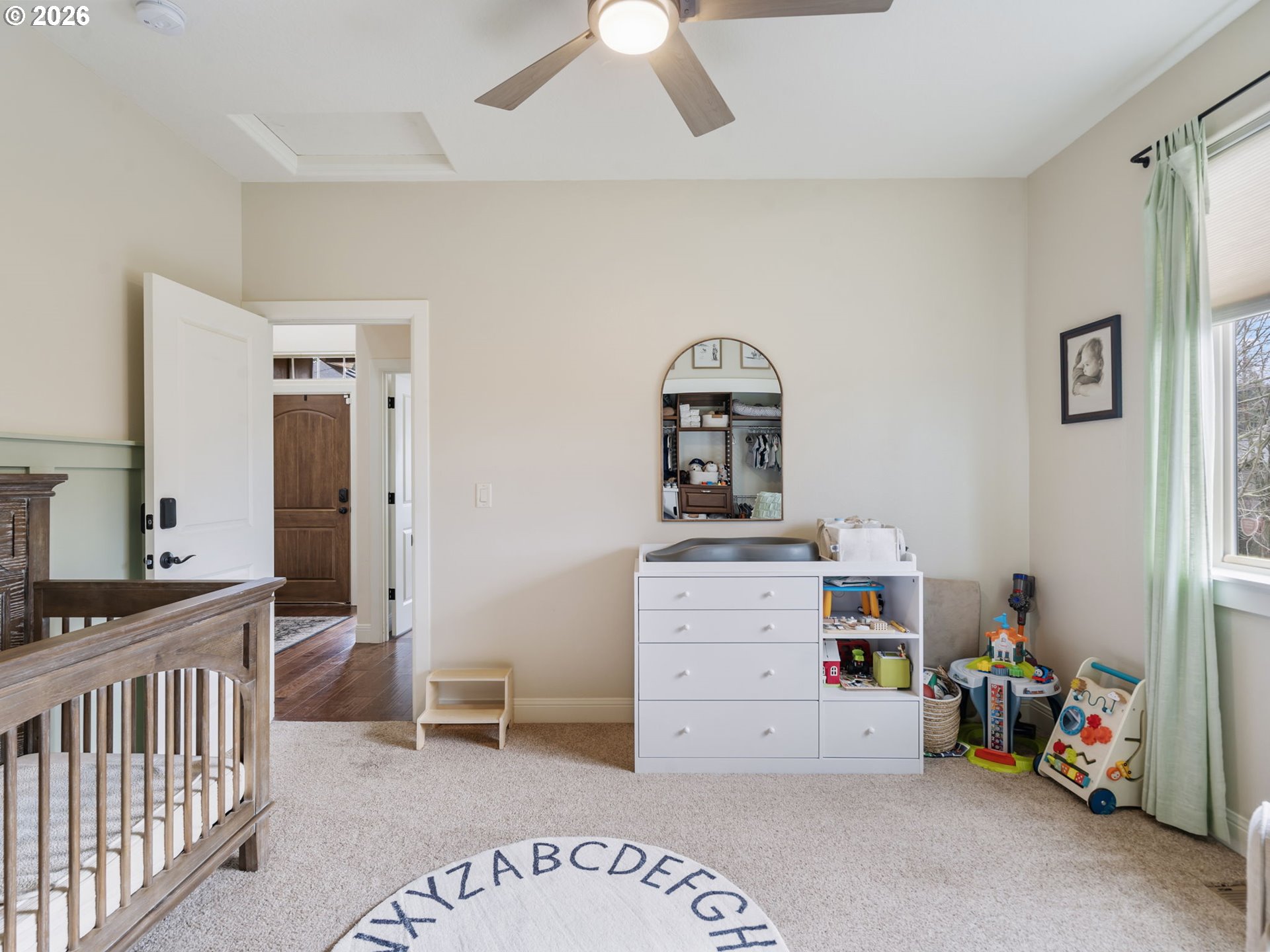 4081 Southwest Binford Avenue Gresham, OR 97080 - Photo 36 of 43 a view of a bedroom with baby crib and bedroom