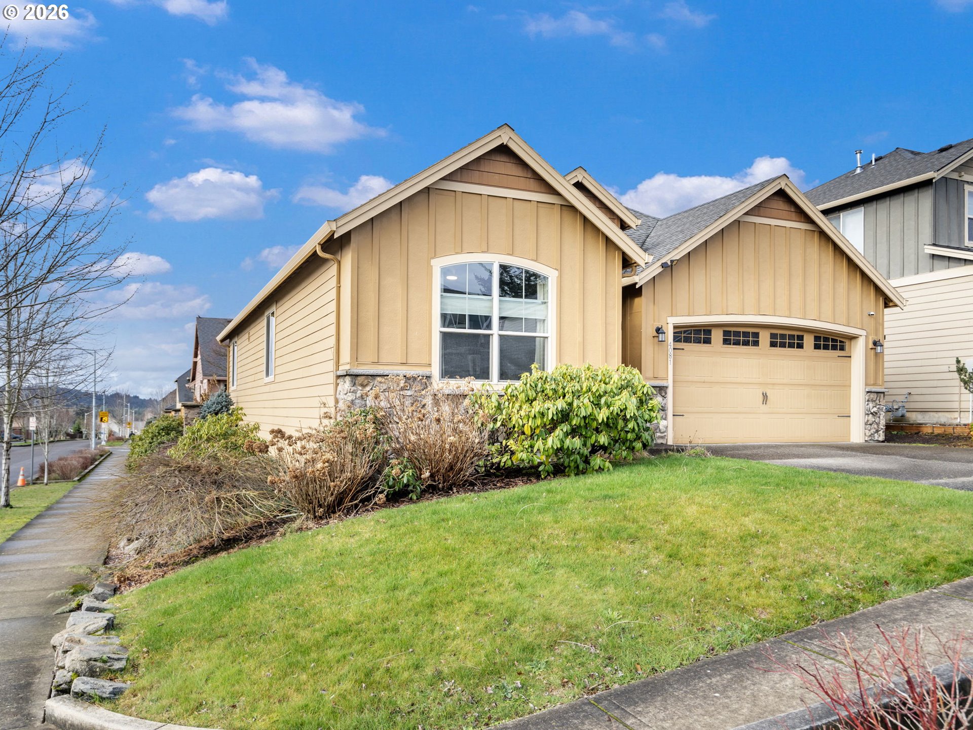 4081 Southwest Binford Avenue Gresham, OR 97080 - Photo 4 of 43 a view of a yard in front of a house with plants