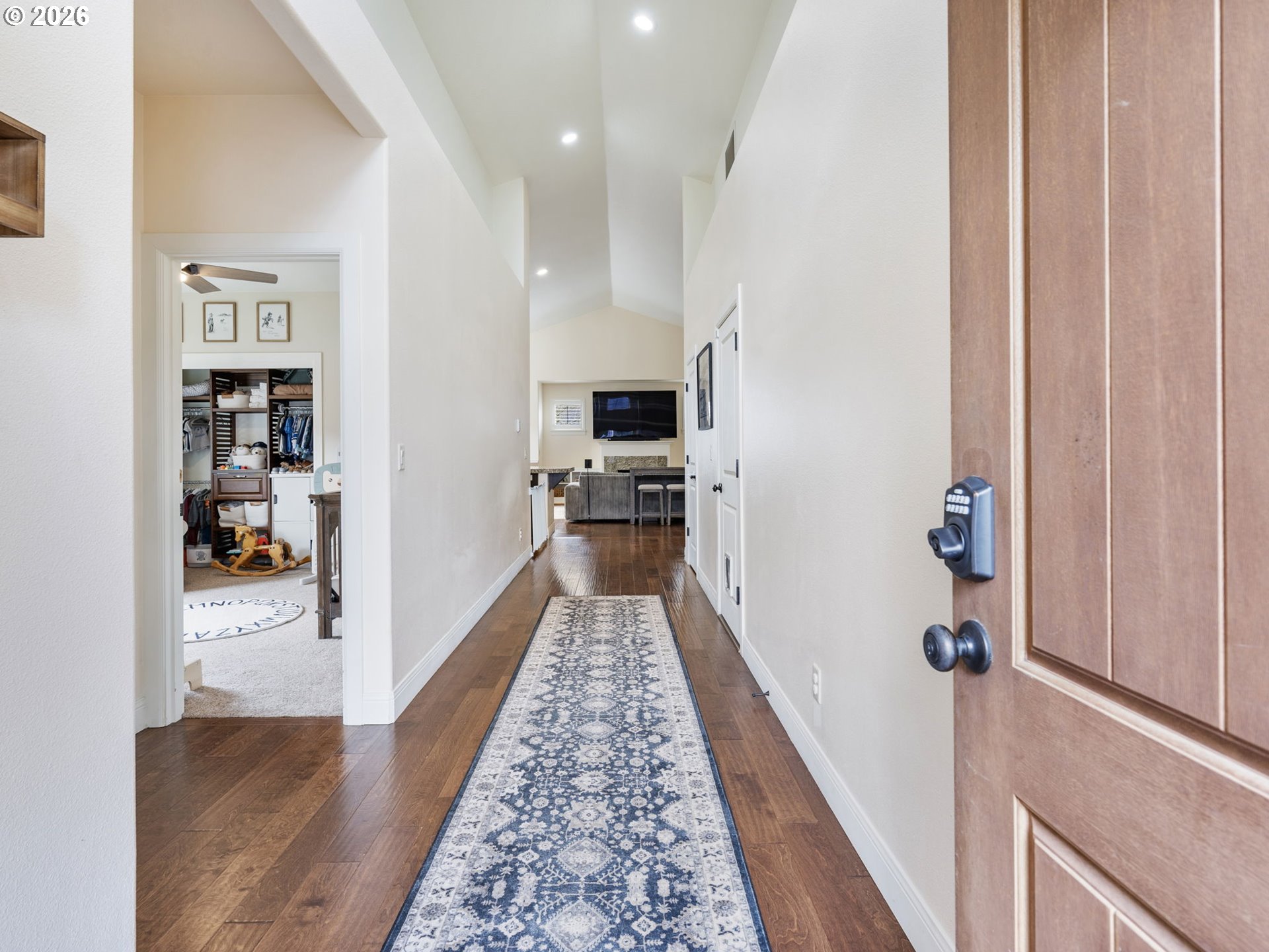 4081 Southwest Binford Avenue Gresham, OR 97080 - Photo 8 of 43 a view of a hallway with wooden floor and furniture