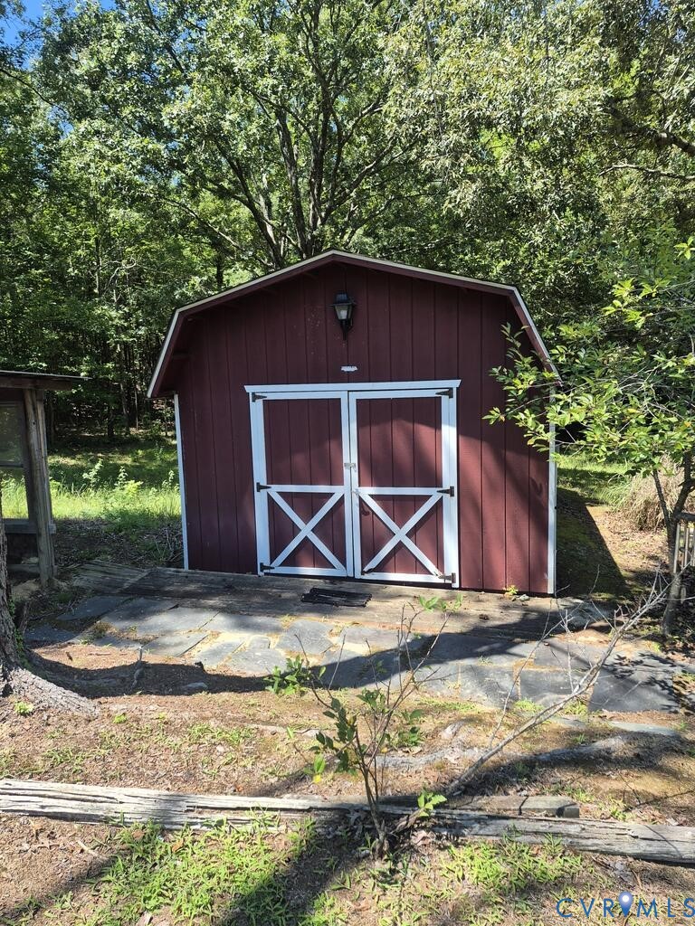519 Buffalo Heights Road Farmville, VA 23901 - Photo 35 of 38 Red exterior building with white barn doors, a gab
