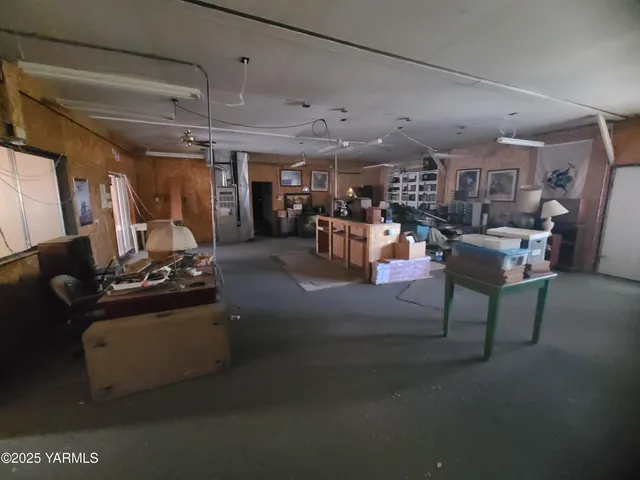 a view of a living room with furniture