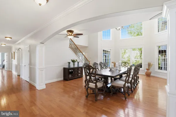 a kitchen with a sink a counter space and stainless steel appliances