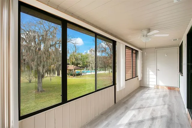 a view of a room with a large window