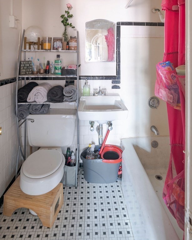 72 Strathmore Road, Unit 7A Boston, MA 02135 - Photo 13 of 16 a bathroom with a sink toilet and shower