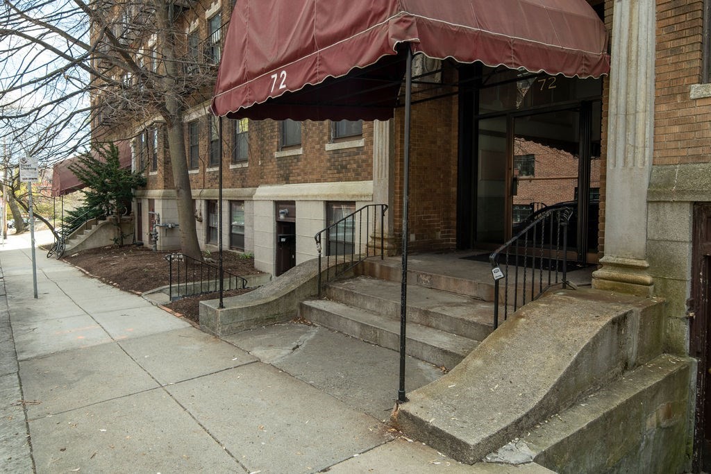 72 Strathmore Road, Unit 7A Boston, MA 02135 - Photo 14 of 16 a view of a house with a patio