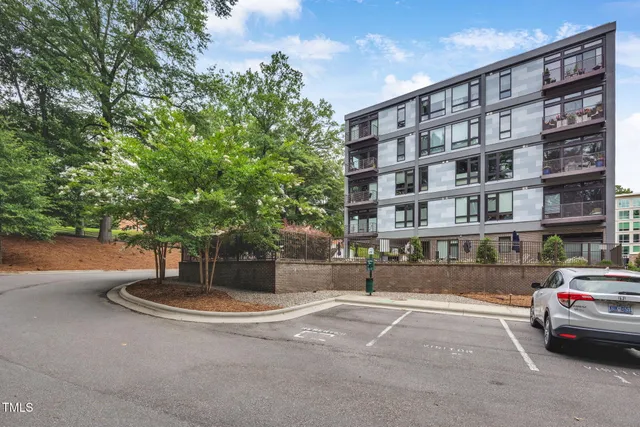 a front view of a building with street view