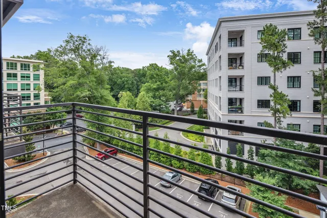 a view of a balcony with an outdoor space