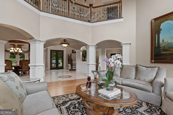 a kitchen with stainless steel appliances granite countertop a stove refrigerator and cabinets