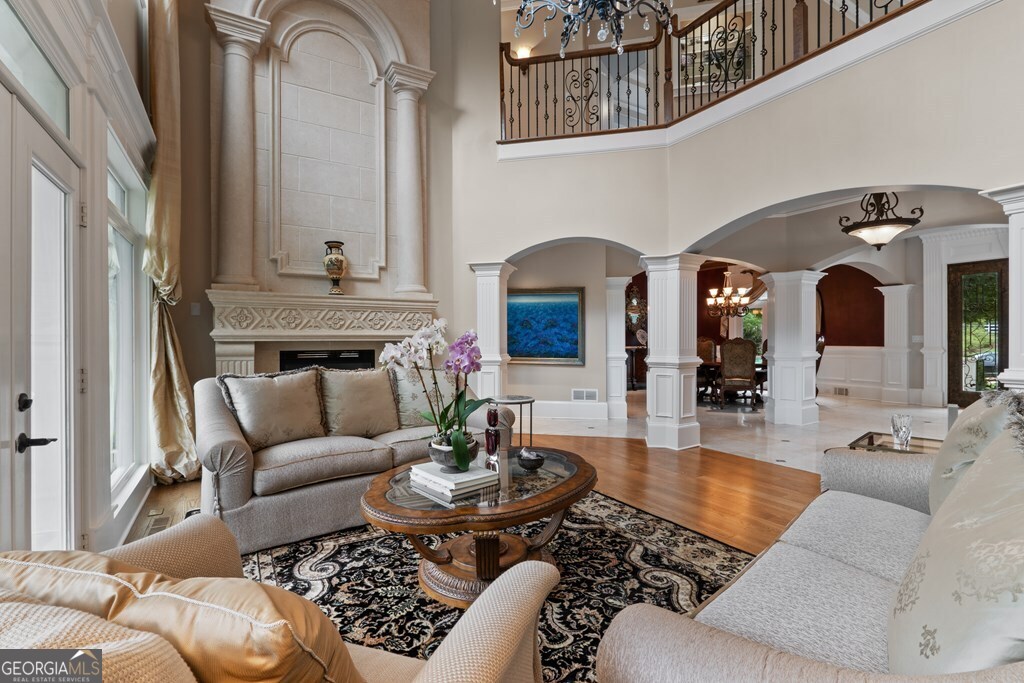 1005 Oak Mountain Road Carrollton, GA 30116 - Photo 13 of 59 a living room with furniture and a fireplace
