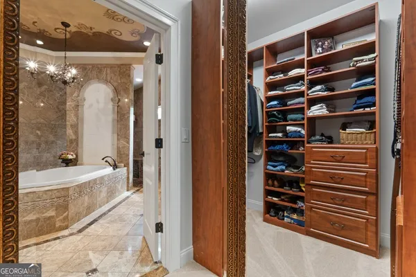 a bathroom with a double vanity sink mirror and toilet