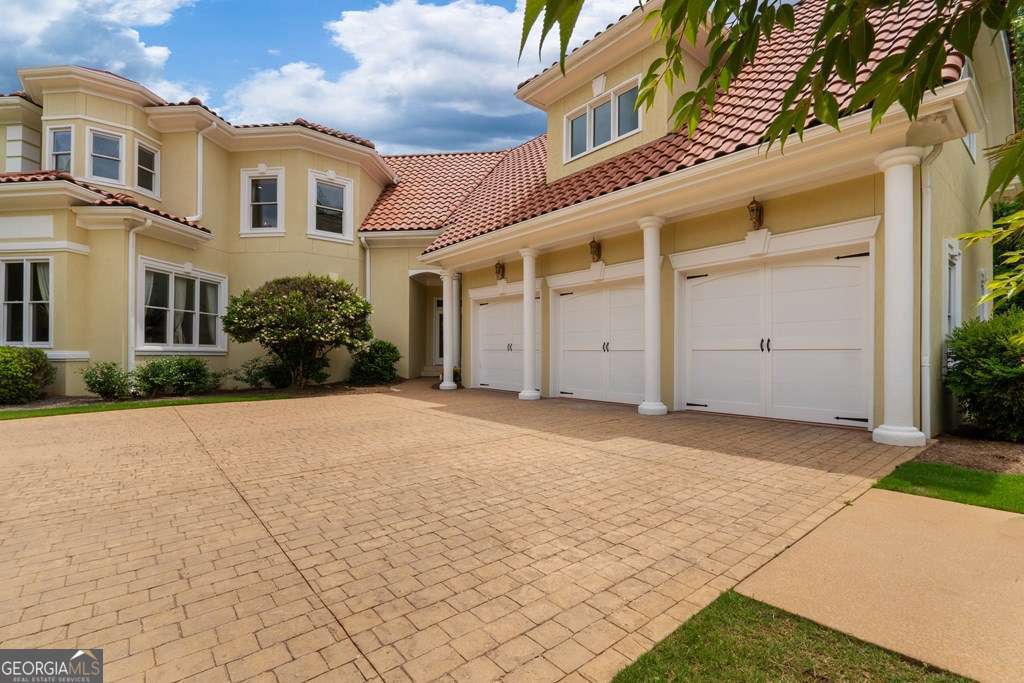 1005 Oak Mountain Road Carrollton, GA 30116 - Photo 4 of 59 front view of a house with a yard