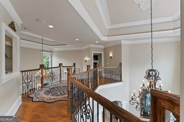 a room with lots of furniture and a large window